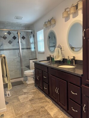Shower, hair dryer, towels, soap