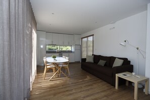 Standard Double Room, 2 Bedrooms, Garden View | Living area | 80-cm Smart TV with cable channels - Arco Bungalows Agroturismo & Relax  (Cabeceiras de Basto)