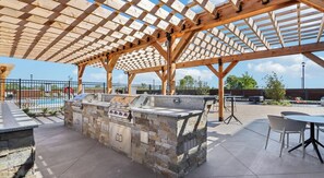 Outdoor dining - Landing | Spectacular 2BD, Rooftop Lounge, Pool (McCordsville)