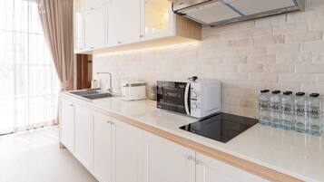 Villa familiar, vista a la alberca | Cocina compartida