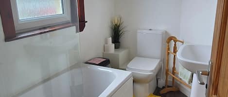 Apartment | Bathroom | Combined shower/tub, deep soaking tub, towels, toilet paper