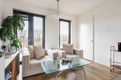 5 minutes from Central Station! Spacious and bright family apartment with roof terrace.