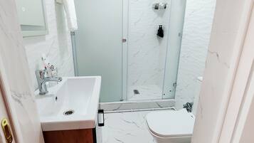 Classic Double Room | Bathroom | Hair dryer, bathrobes, slippers, towels