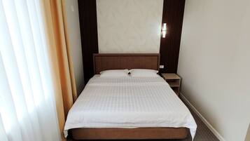 Habitación clásica doble | Ropa de cama de alta calidad y caja fuerte