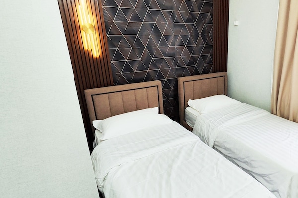 Hochwertige Bettwaren, Zimmersafe, Bügeleisen/Bügelbrett