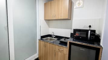 Mini-fridge, microwave, oven, electric kettle