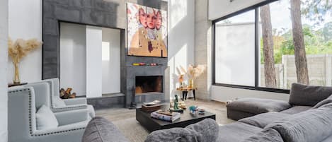 Family House, Garden View | Living room | 50-inch flat-screen TV with digital channels