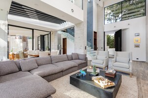 Family House, Garden View | Living area | 50-inch flat-screen TV with digital channels