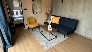 1 slaapkamer, een strijkplank/strijkijzer, wifi, beddengoed