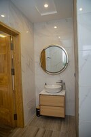 Shower, free toiletries, towels, soap