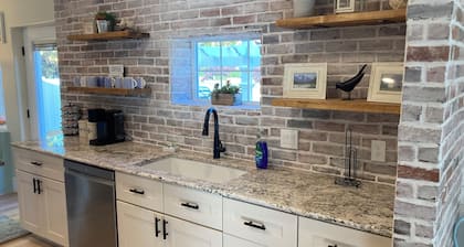 Cozy Cottage in Monroe. Newly remodeled with fun amenities including hot tub!