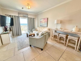 Condo, Multiple Beds (Baywatch E3) | Living area | TV