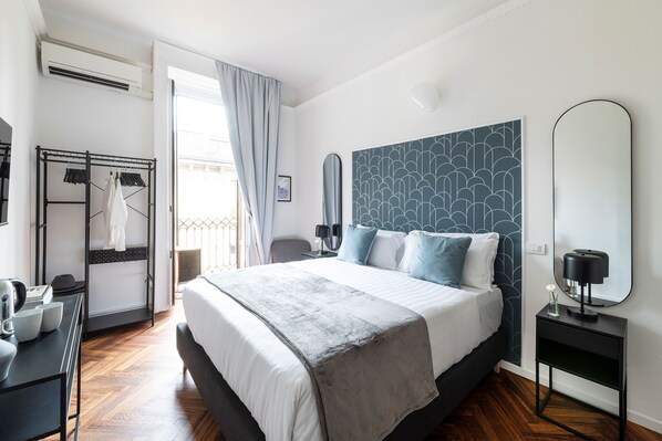 Kahden hengen superior-huone, 2 keskisuurta parisänkyä, tupakointi kielletty | Työpöytä, silitysrauta/-lauta, ilmainen Wi-Fi