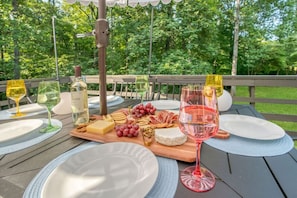 Outdoor dining - 7BR Jamestown Oasis with Hot Tub and Games (Jamestown)