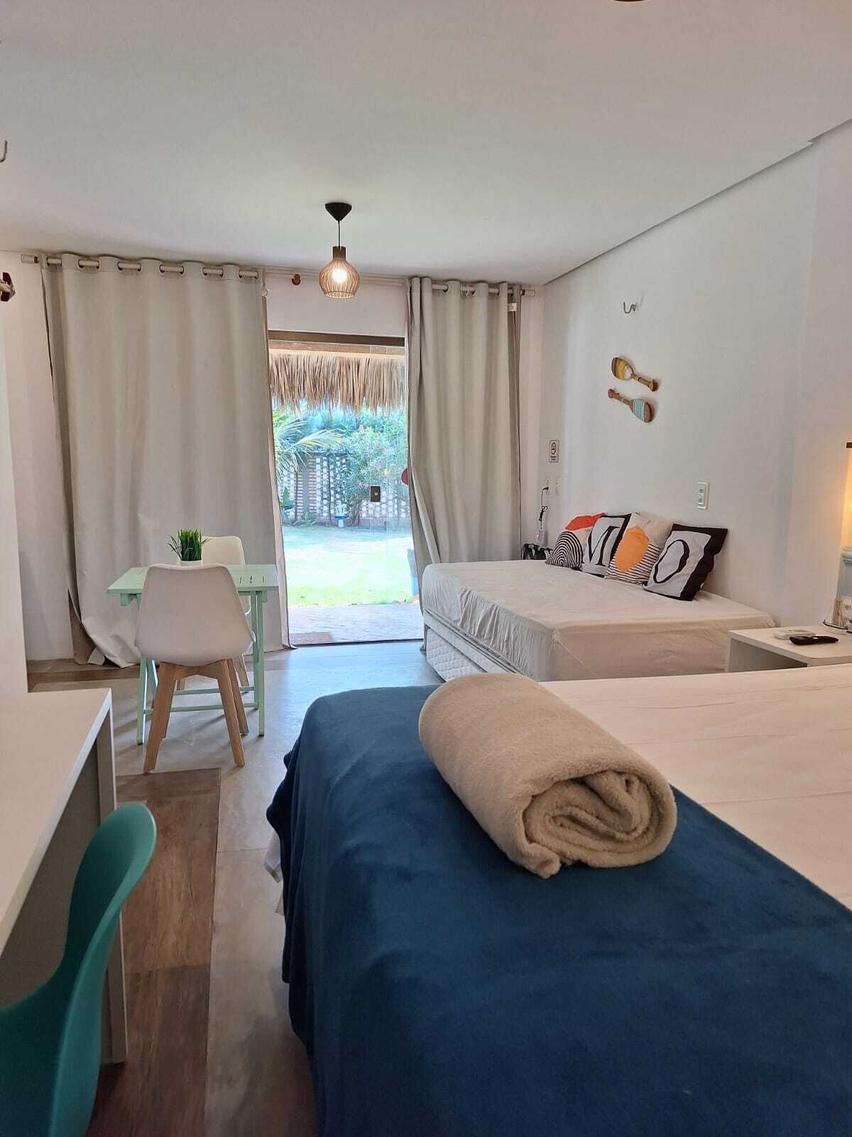 Suite estudio estándar, balcón, vistas al jardín | Decoración individual, mobiliario individual, escritorio