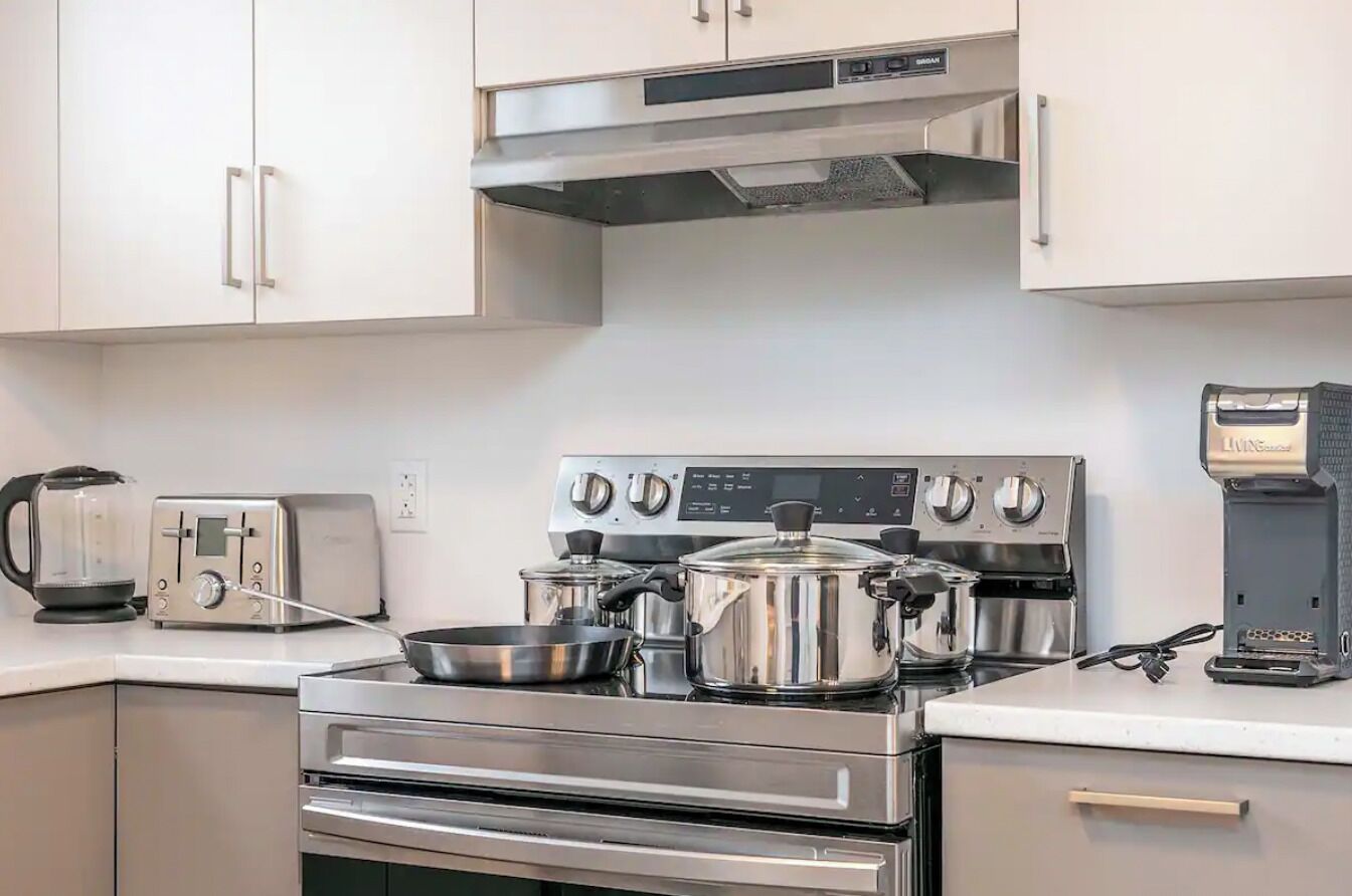 Dishwasher, toaster, high chair, cookware/dishes/utensils