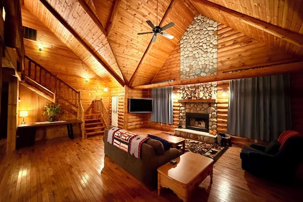 Living Room w Lofted Wood Beam Ceilings