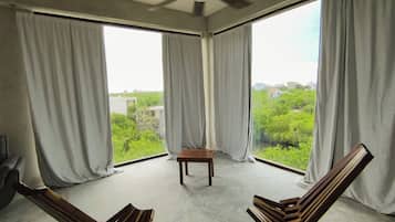 Suite Elite, vistas parciales al mar | 4 dormitorios, wifi gratis, ropa de cama