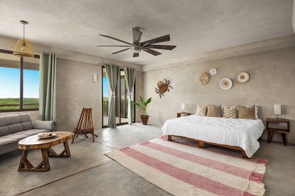 Suite Deluxe, 1 cama de matrimonio grande con sofá cama, vistas al patio | Wifi gratis y ropa de cama