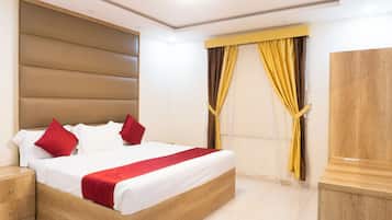 Roupas de cama premium, frigobar, Wi-Fi de cortesia, roupa de cama