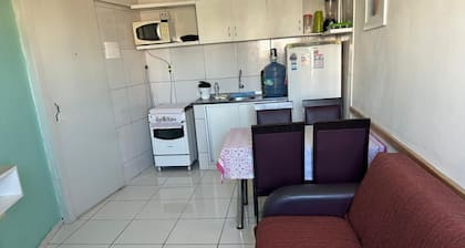 Cozy studio apartment, close to everything, kitchen with lots of utensils.