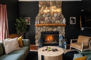 Smart TV, fireplace, books, music library - Modern Torch Lake Retreat: Speakeasy, Hot Tub, Sauna, Golf Sim, Arcade & More (Central Lake)