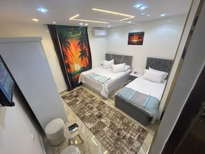 Standard Triple Room | Free minibar, soundproofing, iron/ironing board, free WiFi - Paradise Pyramids View INN (Giza)