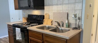 Cozy 1-bedroom condo in charming Village of Four Seasons with WiFi, fitness room