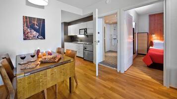 Apartment, 2 Bedrooms, Sauna, Resort View | Private kitchen | Full-sized fridge, microwave, oven, stovetop