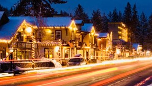 A building with multiple stories, featuring a mix of traditional and modern architectural styles. - Super Clean - Tahoe Park Access! (Tahoe City)