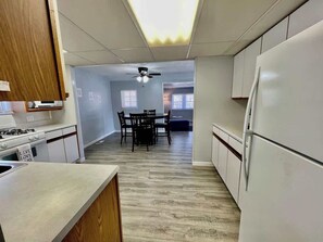 Fridge, microwave, oven, stovetop - The Grandview Lake House | Sleeps 8 | Dog Friendly (Madison)