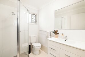 Shower, hair dryer, soap, shampoo