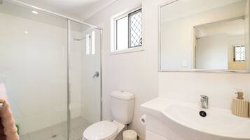 Shower, hair dryer, soap, shampoo
