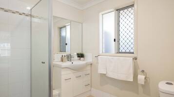 Shower, hair dryer, soap, shampoo