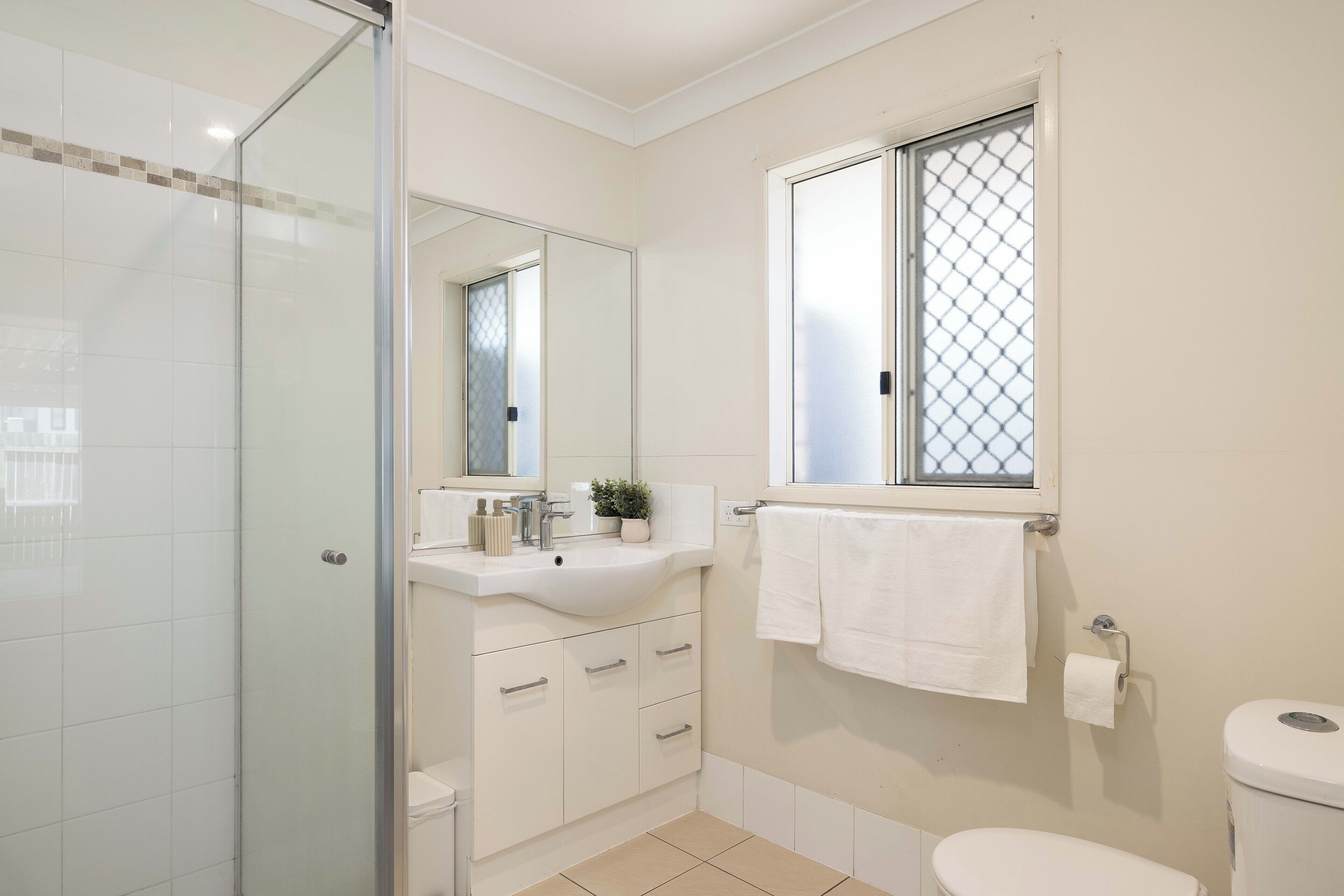 Shower, hair dryer, soap, shampoo