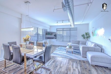 Luxury Loft, 1 Bedroom, Non Smoking, City View | In-room dining. The Stallion