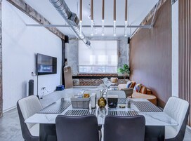 Loft com design assinado, 1 quarto, para não fumantes, vista para a cidade | Opções para refeição no quarto