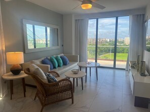 Smart TV - Luxury Getaway: 2-Bedroom Apartment Steps from the Beach and Hard Rock Hotel (Punta Cana)