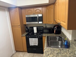 Fridge, microwave, coffee/tea maker, toaster