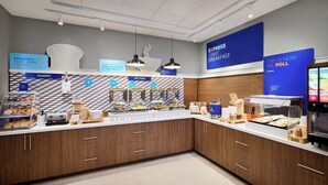 A breakfast area with labeled sections for breakfast, bakery, hot food, and express breakfast. - Holiday Inn Express Hamilton Upper James by IHG (Hamilton)