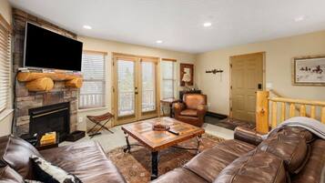 TV connectée, cheminée, jeux vidéo, lecteur de DVD