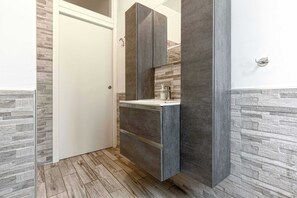 Ducha, secador de pelo