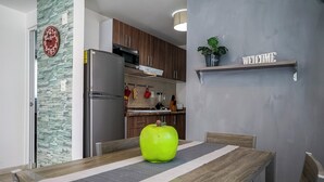 Comfort Apartment, Patio | Dining room - Poliforum Modern 2BR Modern Apartment (León)