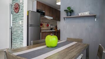 Comfort Apartment, Patio | Dining room
