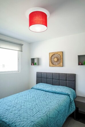 Comfort Apartment, Patio | 2 bedrooms, iron/ironing board, free WiFi - Poliforum Modern 2BR Modern Apartment (León)