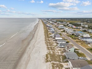 On the beach - Oceanfront Gem with Stunning Views, Spacious Deck, Outdoor Shower, and Grill (Oak Island)