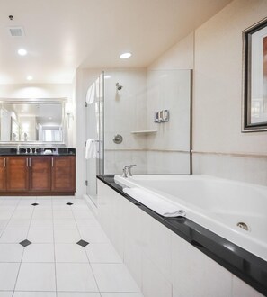 Shower, jetted tub, hair dryer, towels