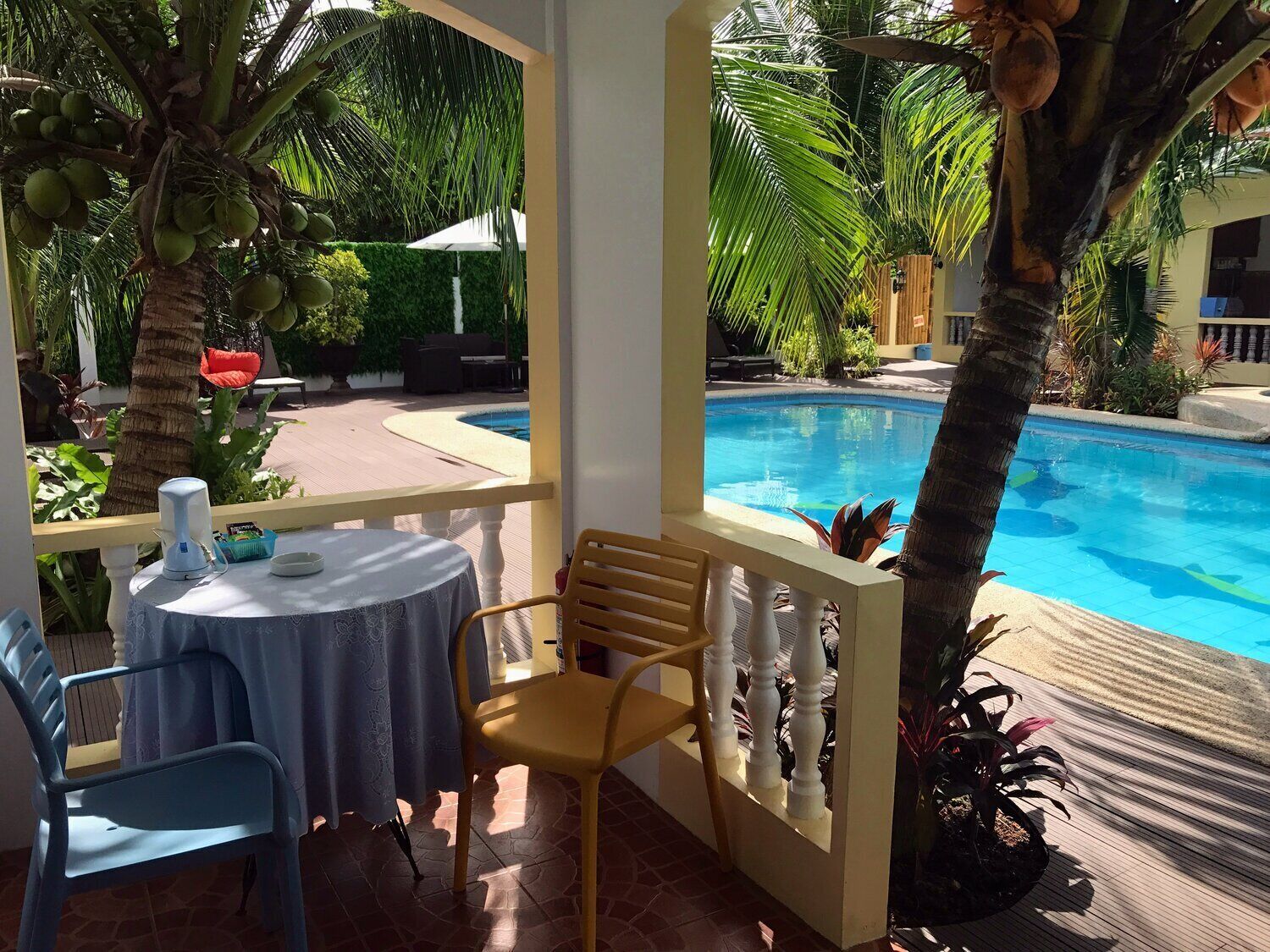 Outdoor pool, open 8:00 AM to 11:00 PM, pool umbrellas, sun loungers