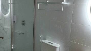 Shower, slippers, soap, shampoo