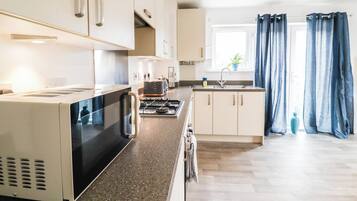 Fridge, microwave, oven, stovetop